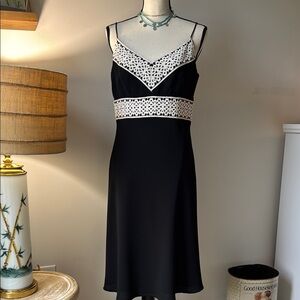 Stylish Black Dress with White Lace Accents